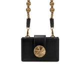Alessa Black Card Holder with metallic threaded strap and embroidered disc fastener, showcasing elegant design details.