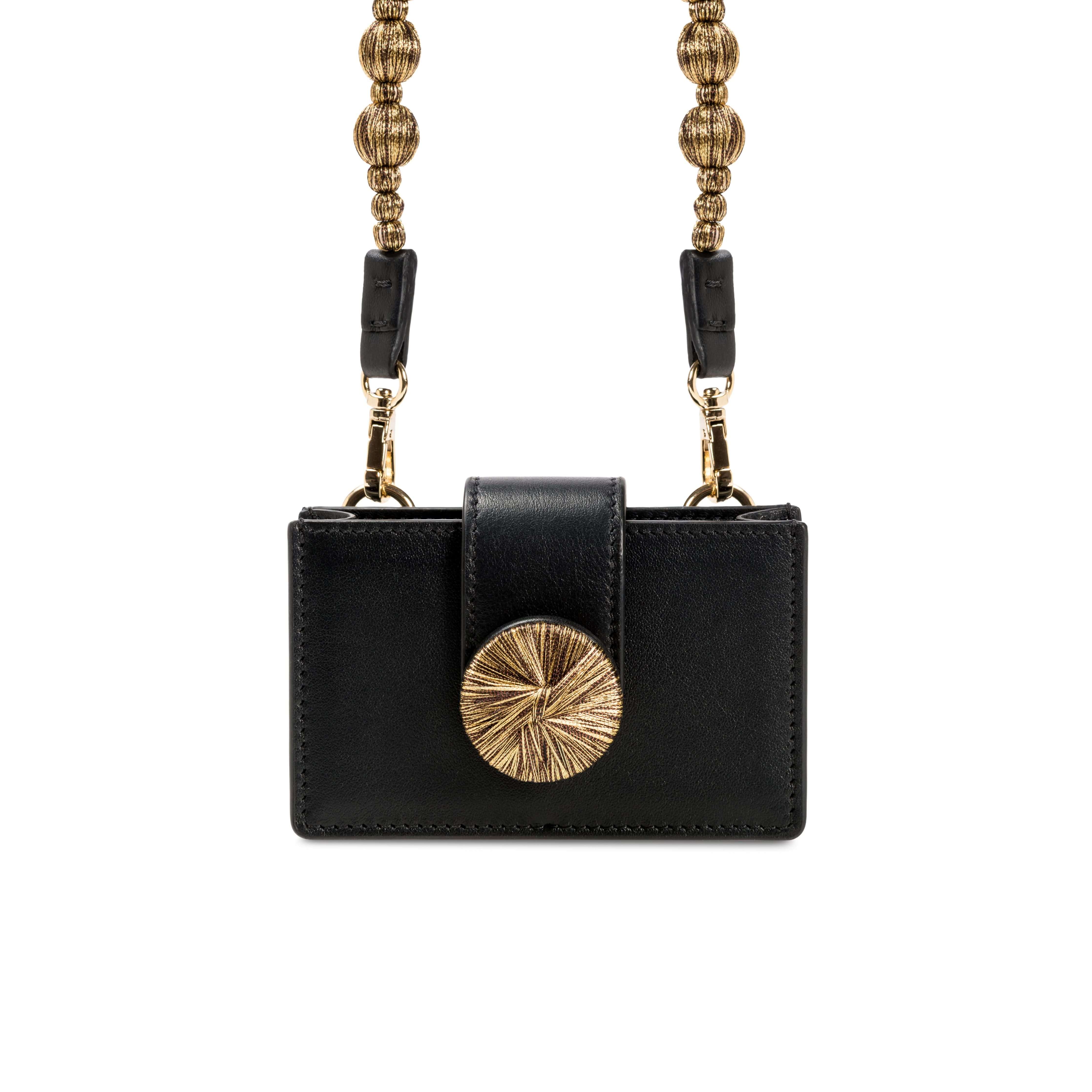 Alessa Black Card Holder with metallic threaded strap and embroidered disc fastener, showcasing elegant design details.