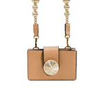Alessa Cappucino Card Holder featuring a handcrafted metallic threaded design and an embroidered disc closure with a detachable strap.
