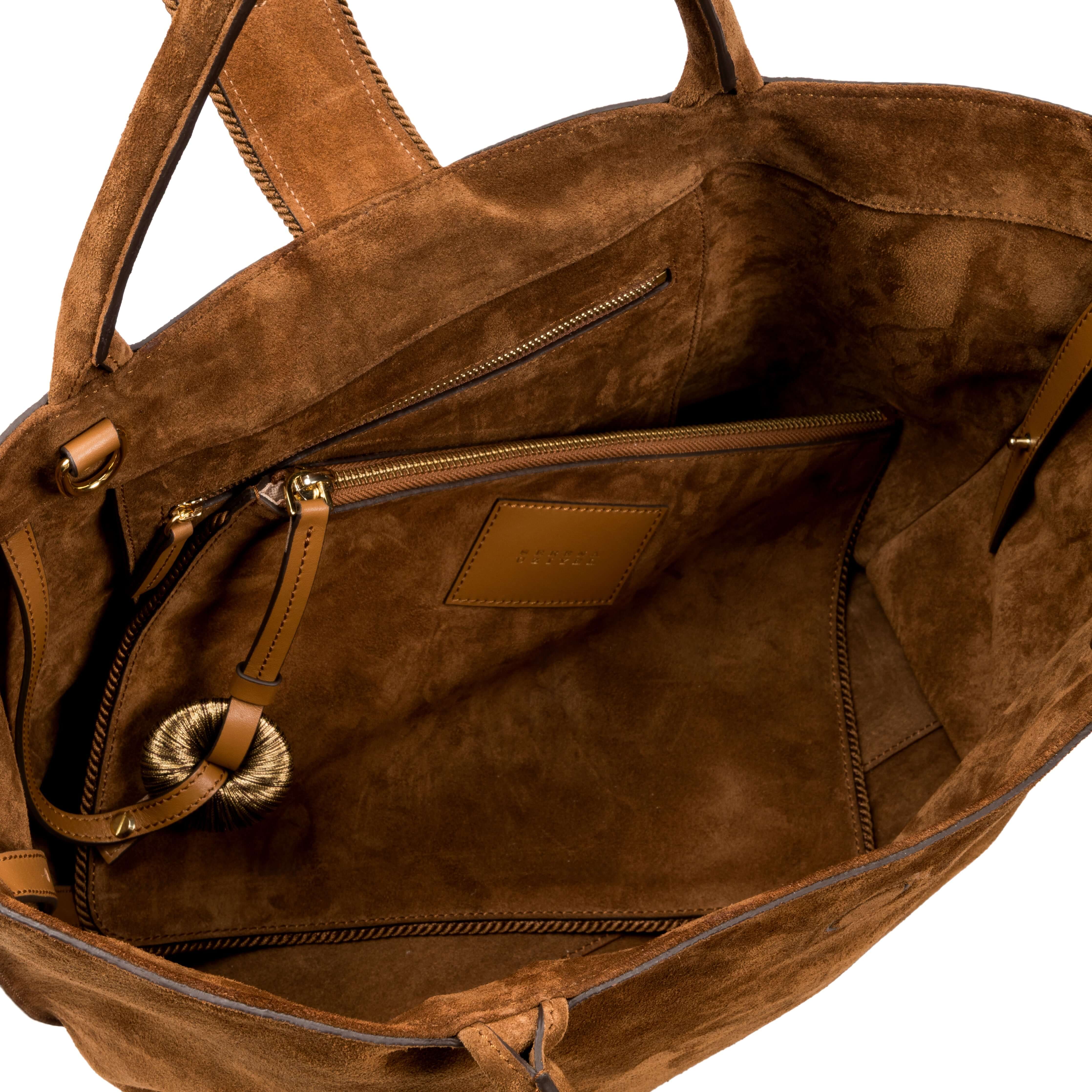 Interior view of the Boho Chic Medium Camello Tote Bag featuring soft suede texture and multiple pockets for organization.