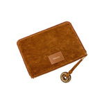 Boho Chic medium camello tote bag in suede finish, featuring a stylish zipper and a round leather charm.
