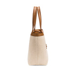 Side view of a Boho Chic medium off-white tote bag featuring textured fabric and brown leather accents.