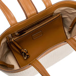 Interior view of Boho Chic medium off-white tote bag showcasing stylish compartments and a brown pouch.