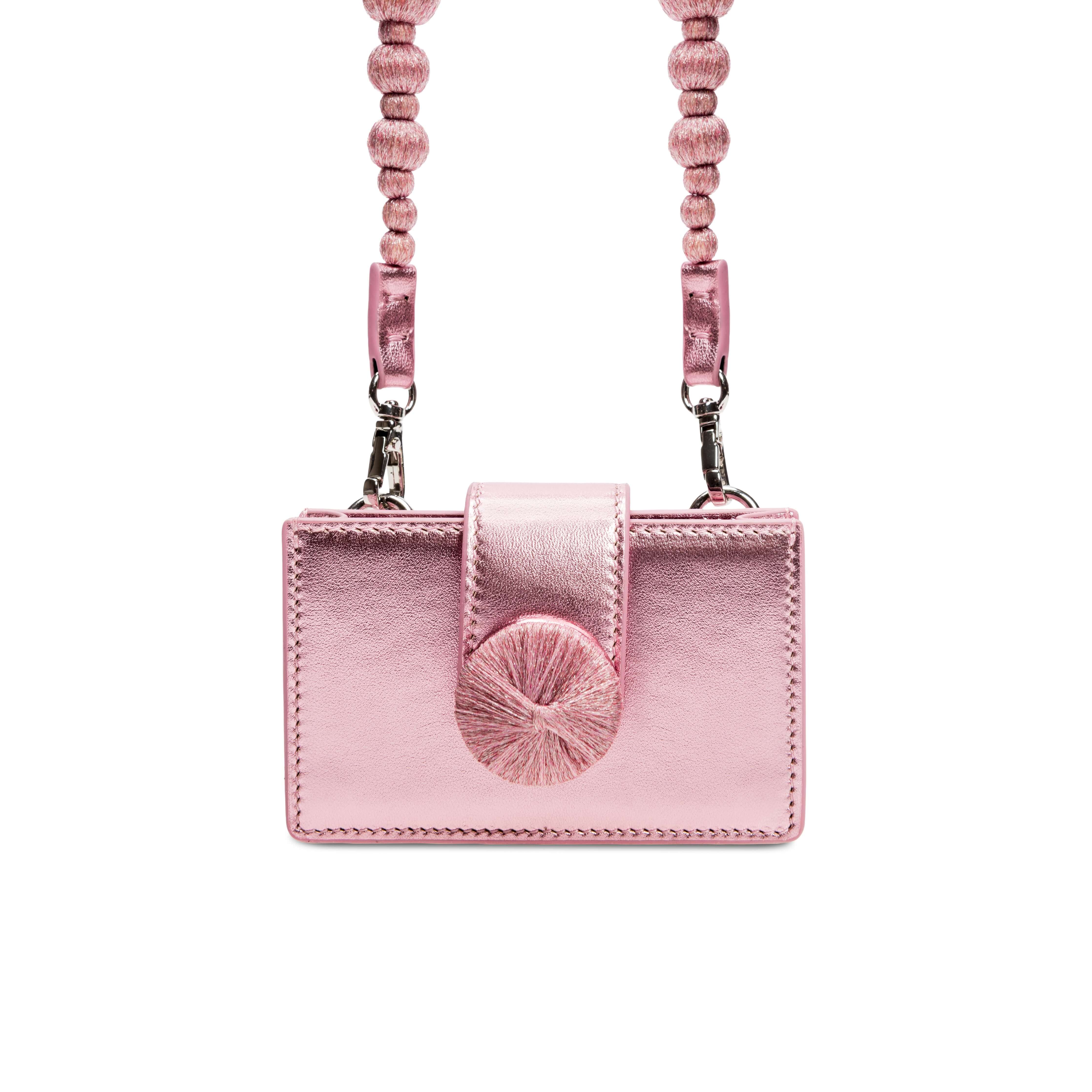 Alessa Metallic Pink Card Holder with textured design and strap, perfect for stylish organization.