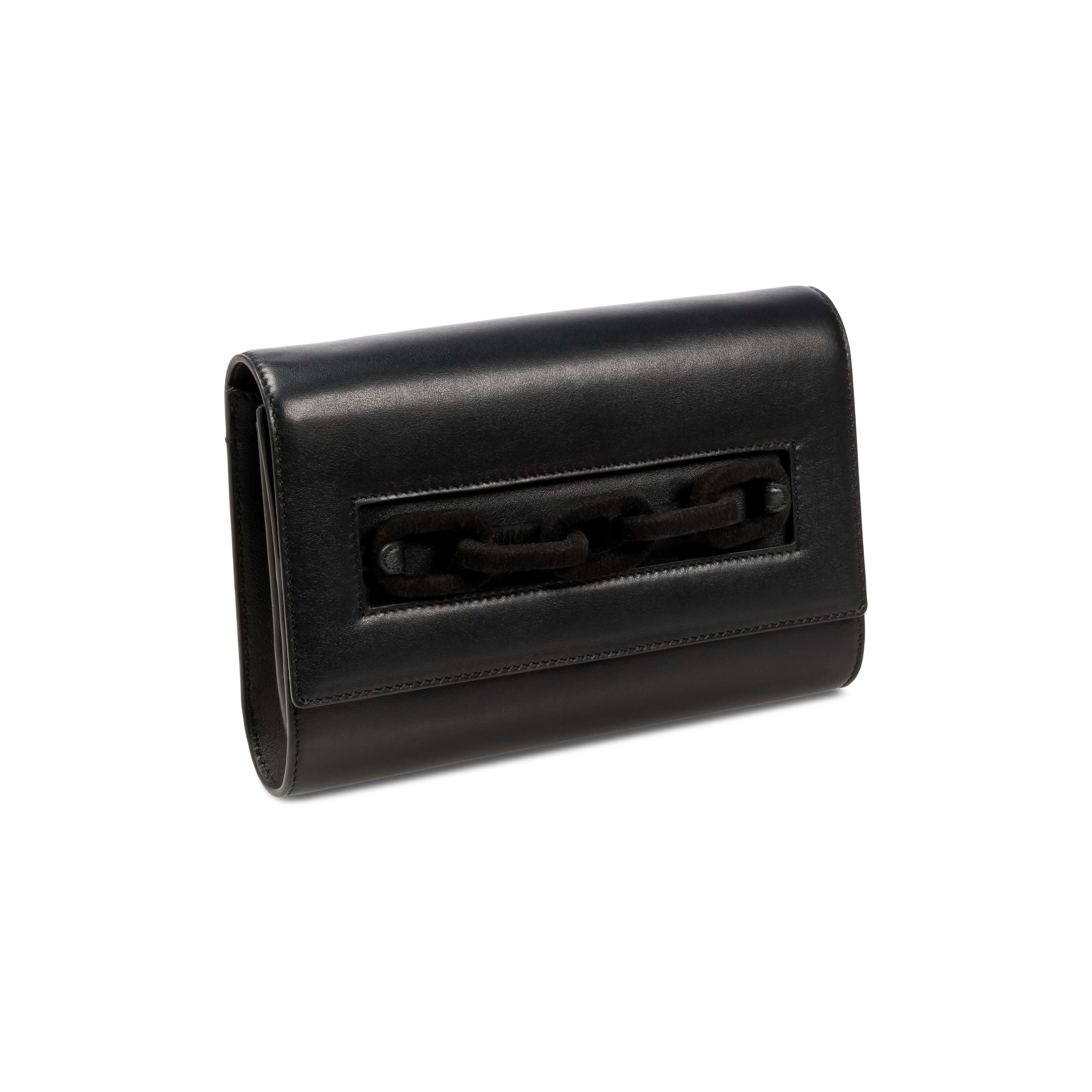 Catena Day to Night Black Bag in luxurious Italian leather with unique chain link detail and elegant rectangular silhouette.