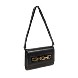 Catena Day to Night Black Bag featuring gold chain closure, Italian leather, and a versatile strap for effortless styling.