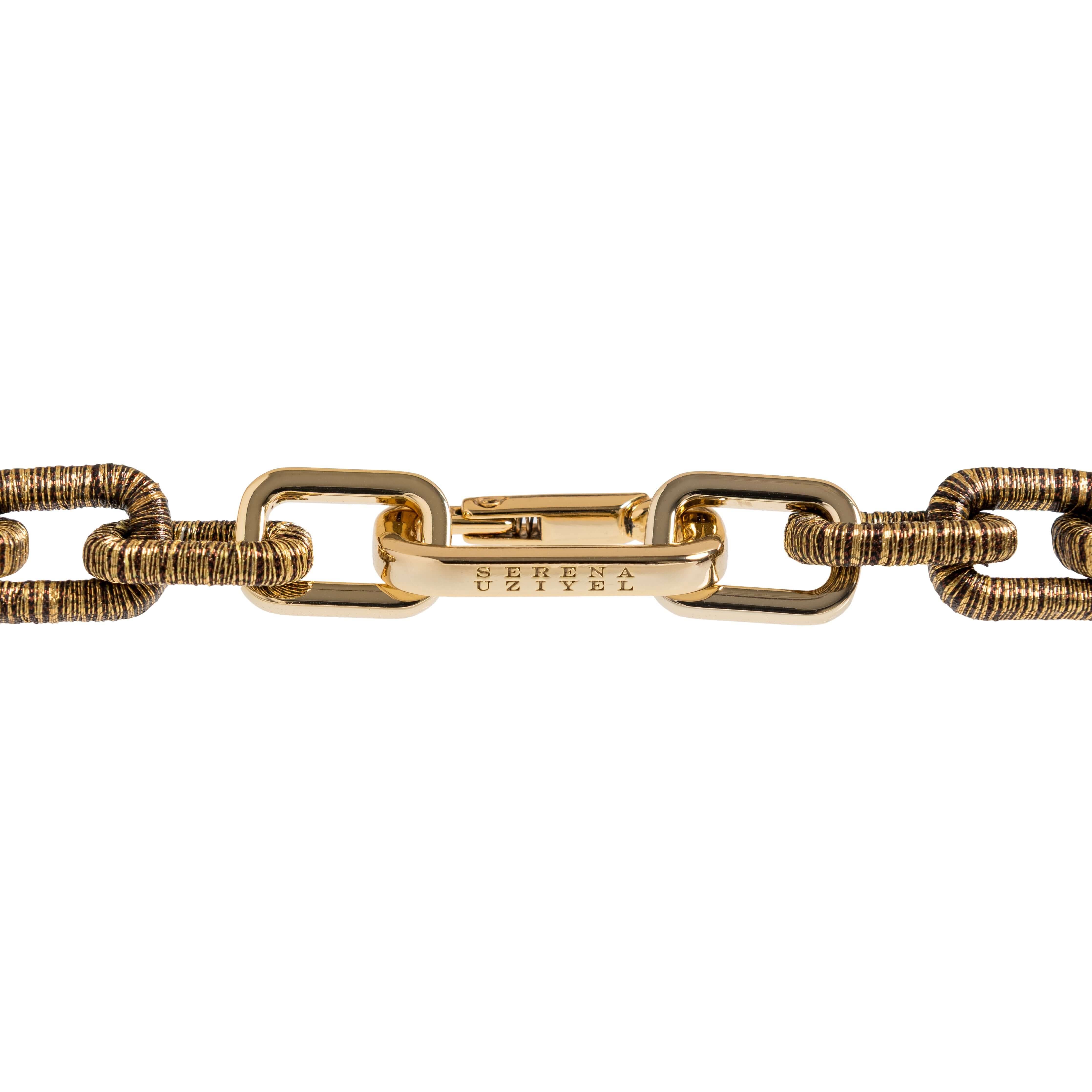 Close-up of the Catena Notte Bracelet in antique gold, showcasing its elegant link design.