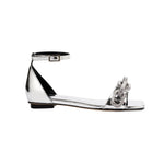 Catena mirror flat ankle sandal featuring a stylish design with metallic finish, perfect for trendy summer outfits.