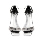 Catena Mirror Flat Ankle Sandal featuring clear straps and a chic design, perfect for stylish summer outings.