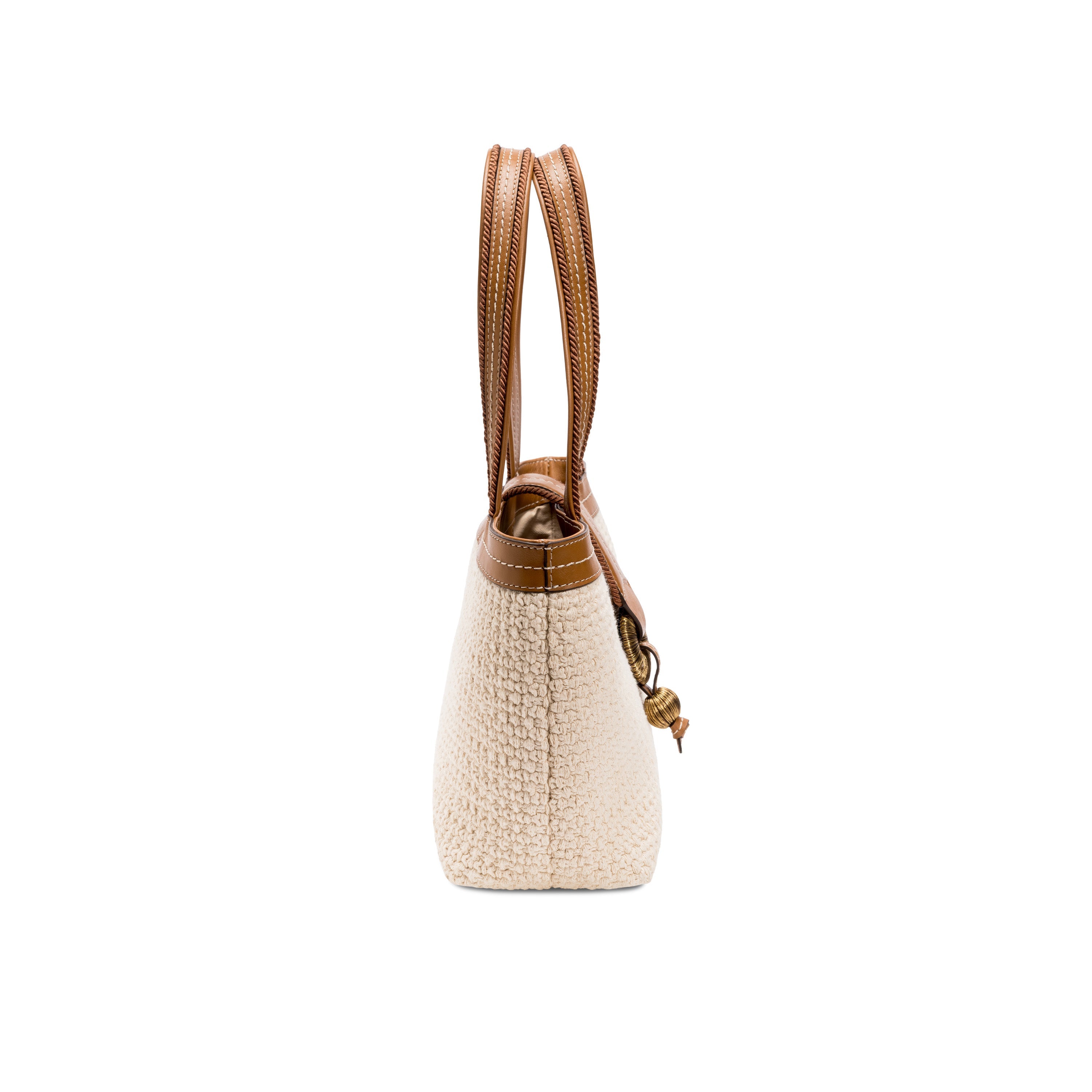 Boho Chic Small Off White Tote Bag displayed from the side view showcasing its structure and design elements.