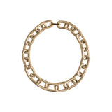 A light gold-toned chain-style necklace made of links wrapped in thread, creating a soft, textured feel that shimmers like a jewel in the light. It fastens with a metal clasp for secure closure  on a white background.