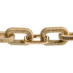 Close-up of Catena Necklace featuring a gold chain and clasp by Serena Uziyel.