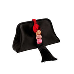 Alessa Black Pouch Bag featuring intricate thread-wrapped coins and a stylish tassel for an elegant touch.
