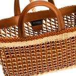 Almeria Camello Large Tote Bag in raffia and leather, showcasing a chic woven design and stylish detachable wallet.