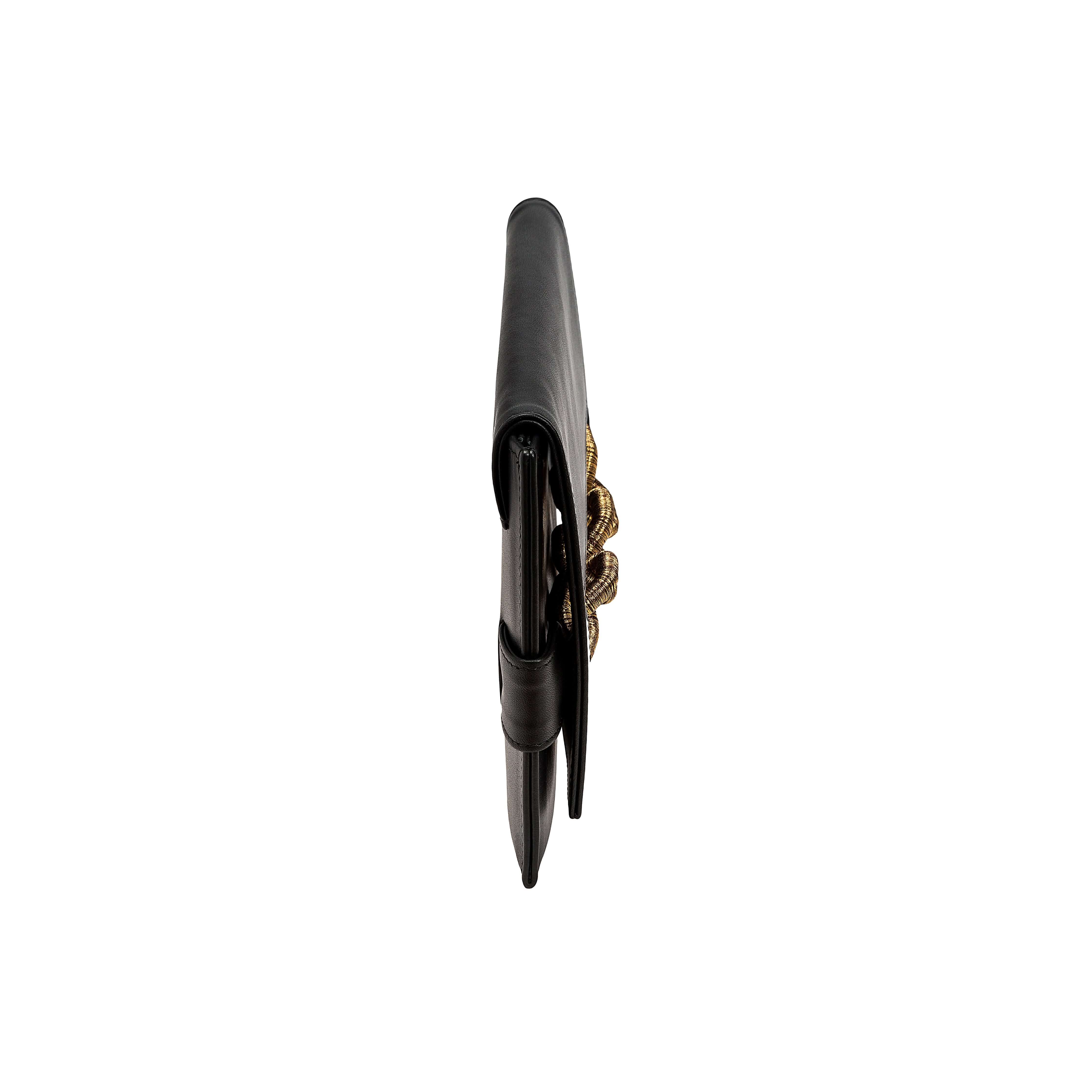 Side view of the Catena Black Envelope Clutch, showcasing Italian leather and antique gold chain embroidery.