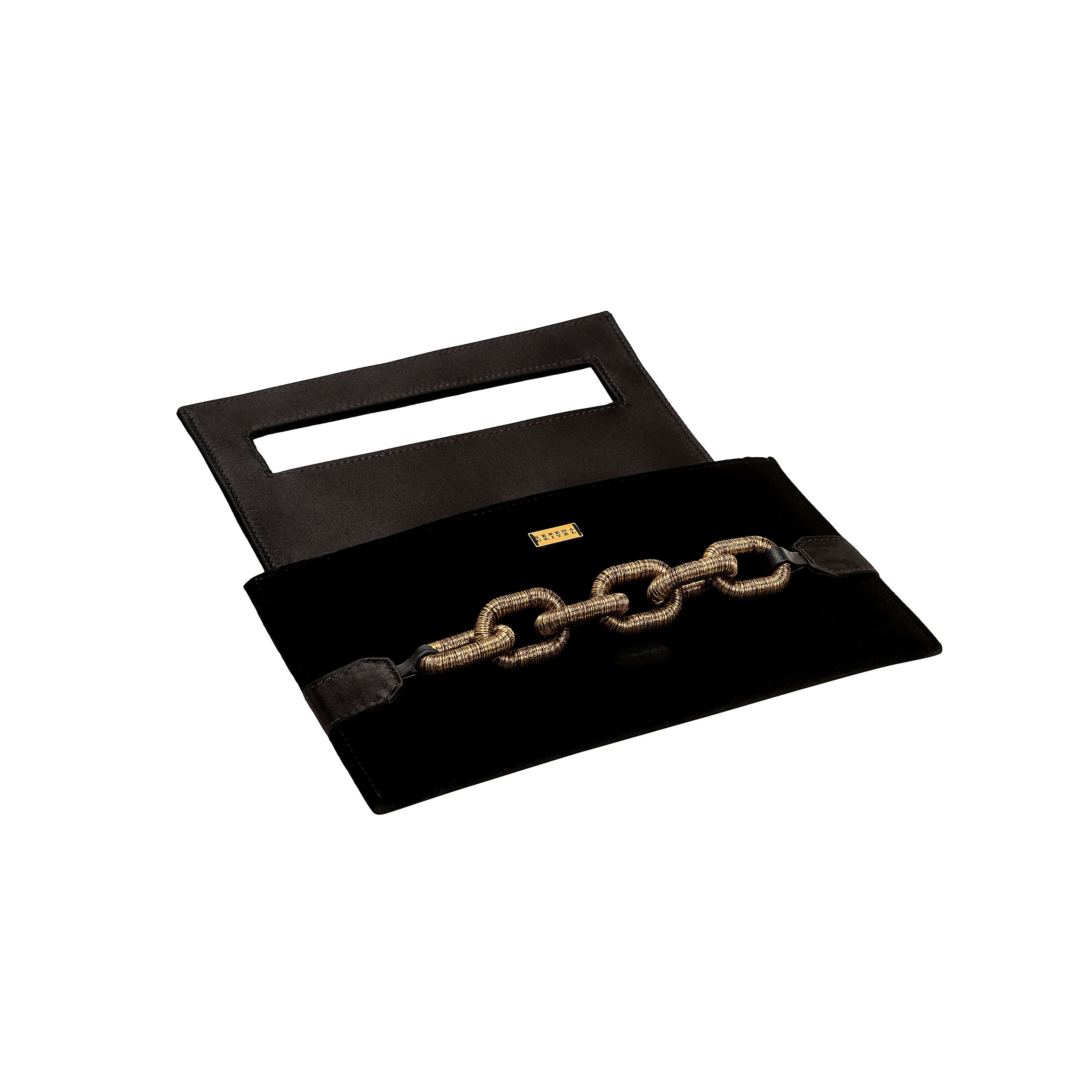 Catena Black Envelope Clutch made of velvet with antique gold chain detail, perfect for elegant occasions.