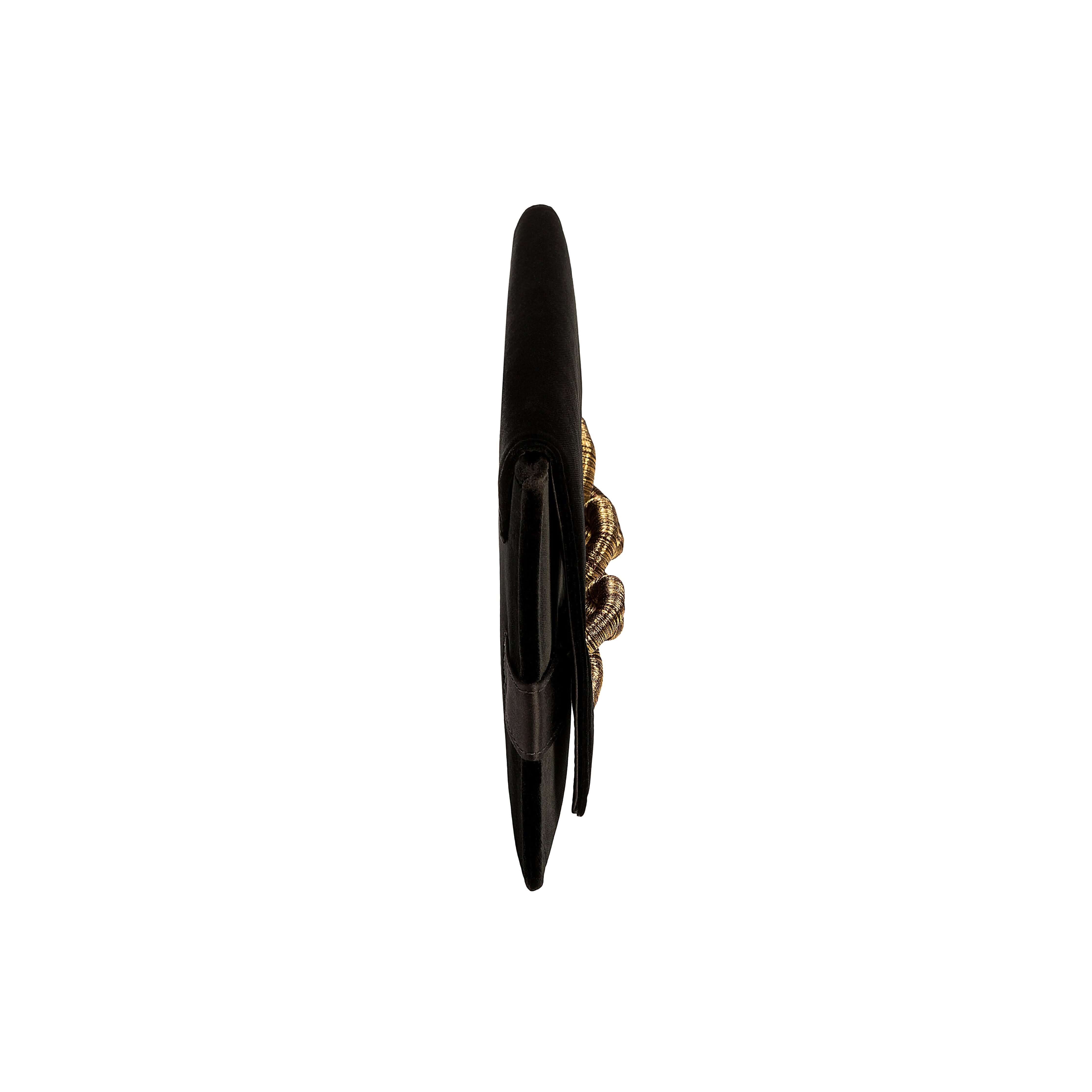 Catena Black Envelope Clutch in velvet with metallic black and antique gold details, showcasing elegant style and luxury.