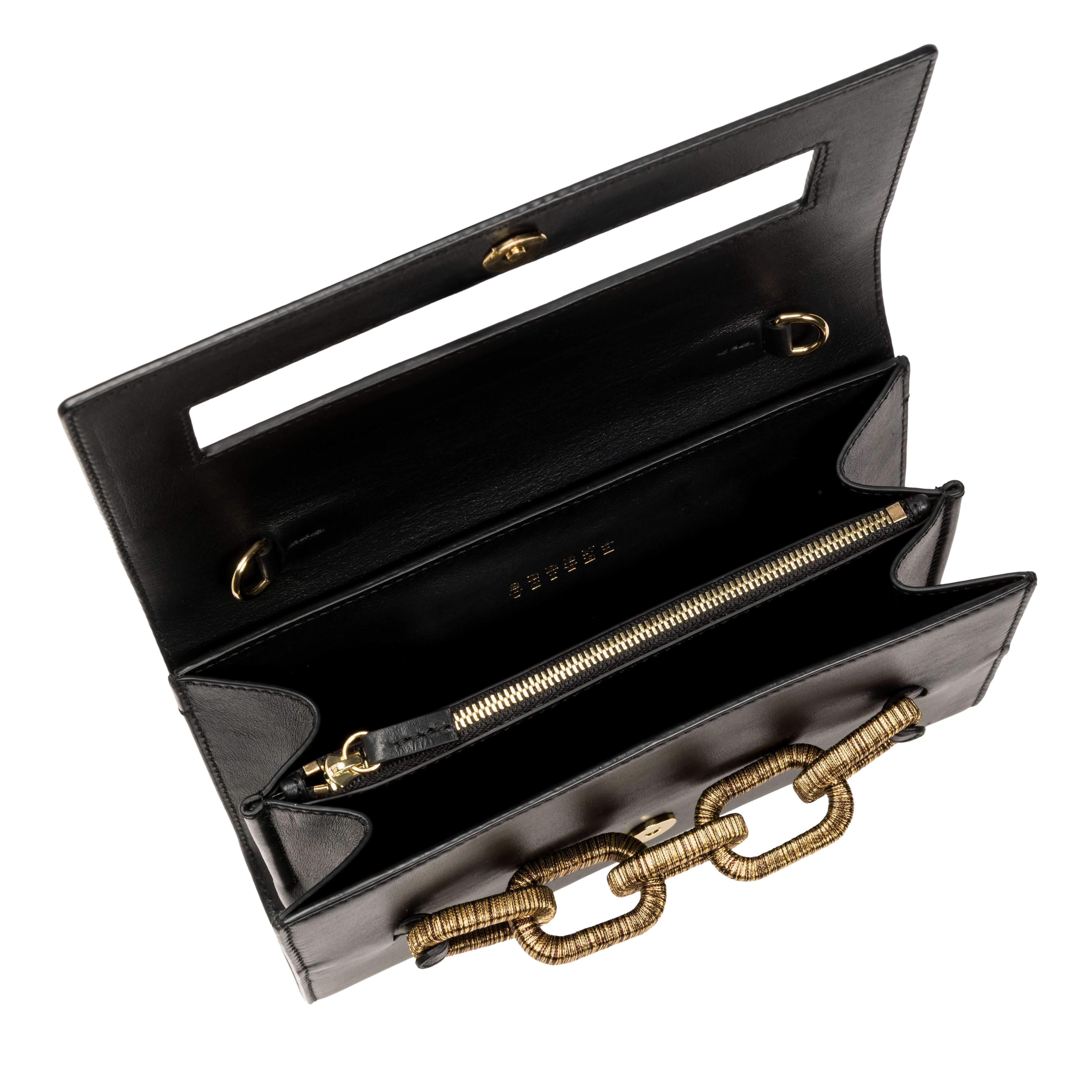 Elegant open Catena Day to Night Black Bag showcasing Italian leather and unique chain link design.