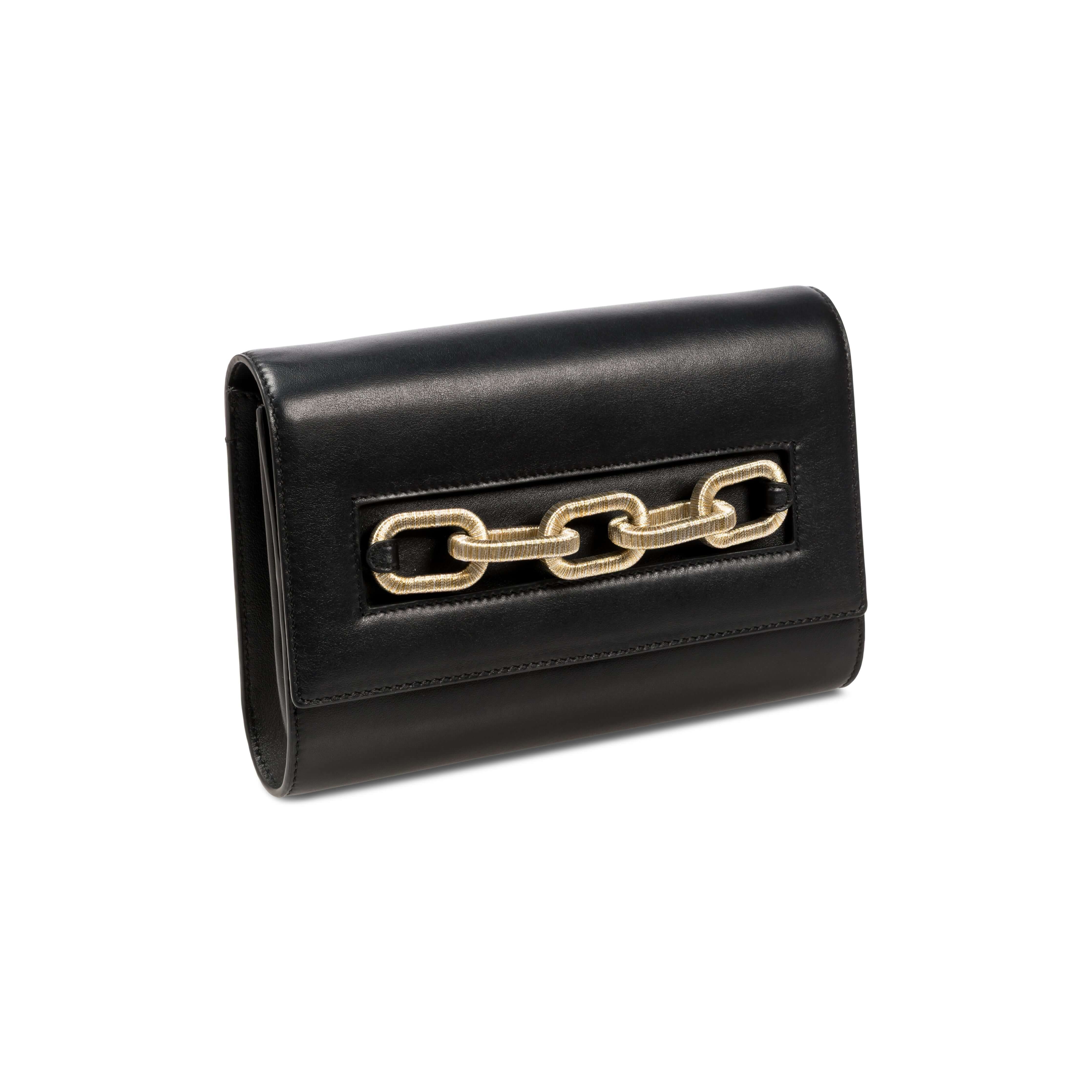 Catena Day to Night Black Bag featuring Italian leather, chain detail, and elegant rectangular design for versatile styling.