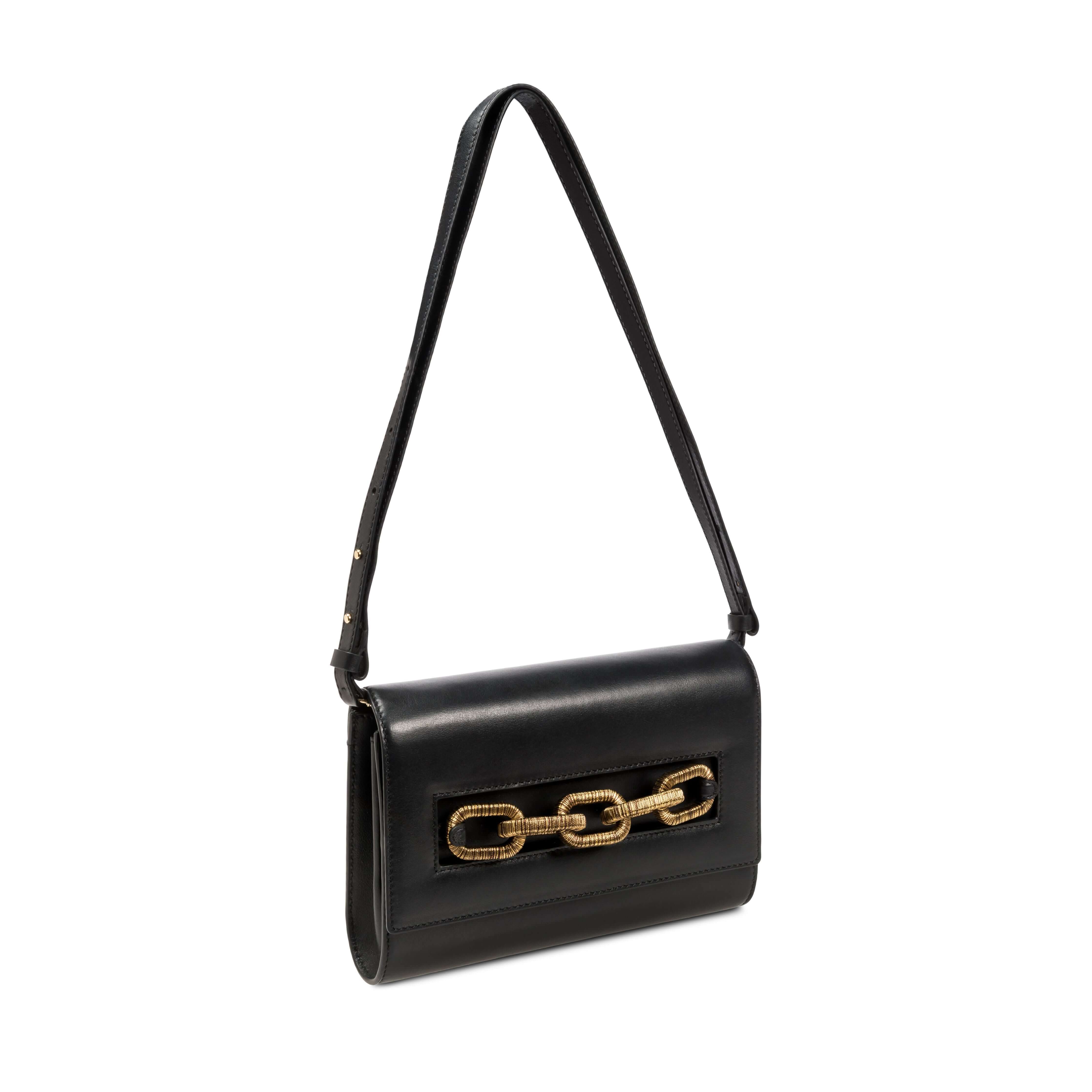 Catena Day to Night Black Bag featuring gold chain closure, Italian leather, and a versatile strap for effortless styling.