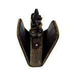 Catena Glitter Two Sided Bag showcasing a stylish gold and black design with unique knot detailing.