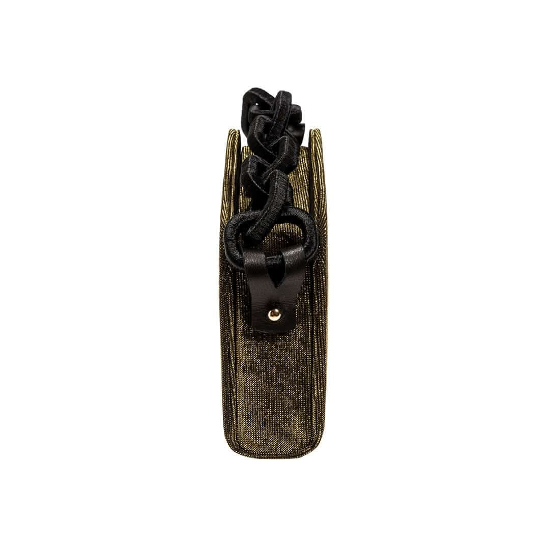 Stylish Catena Glitter Two Sided Bag featuring a unique gold design and intricate black handle.