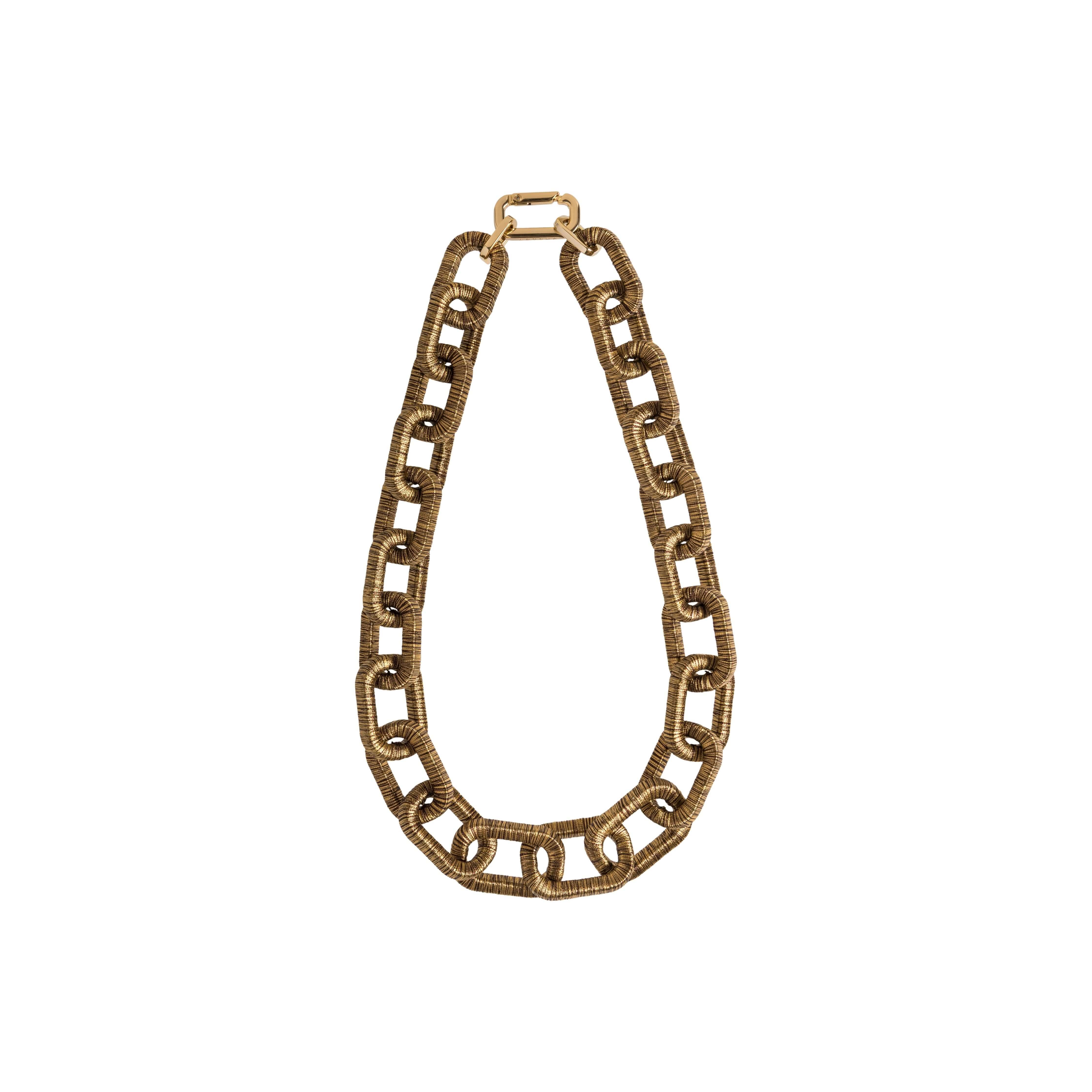 Catena Necklace in Antique Gold featuring a unique chain link design, perfect for adding elegance to any outfit.