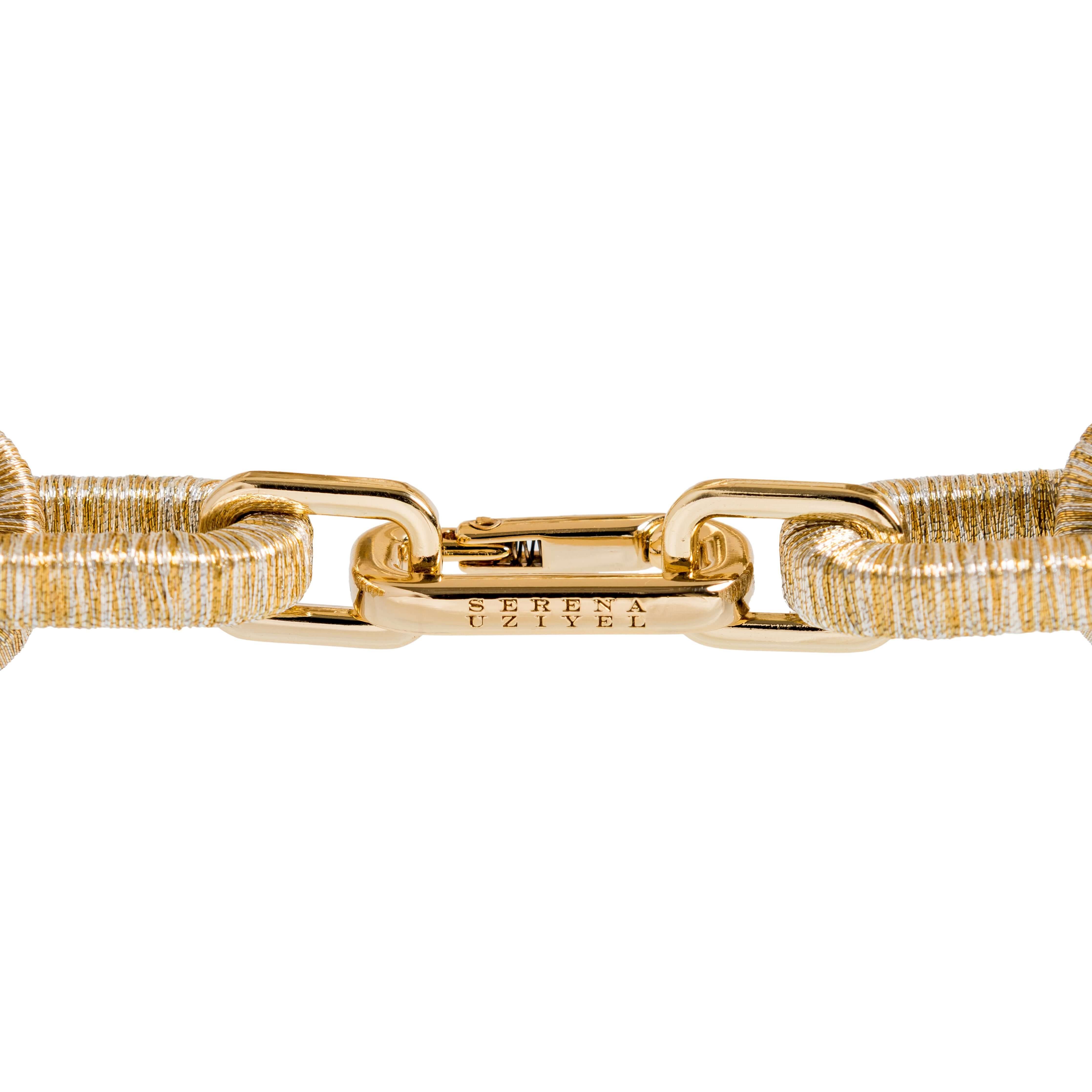 Close-up of the gold clasp on the Catena Necklace, showcasing intricate detailing and quality craftsmanship.