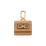 Catena Notte Cappucino AirPods case in chic caramel color with gold hardware and decorative chain detail.