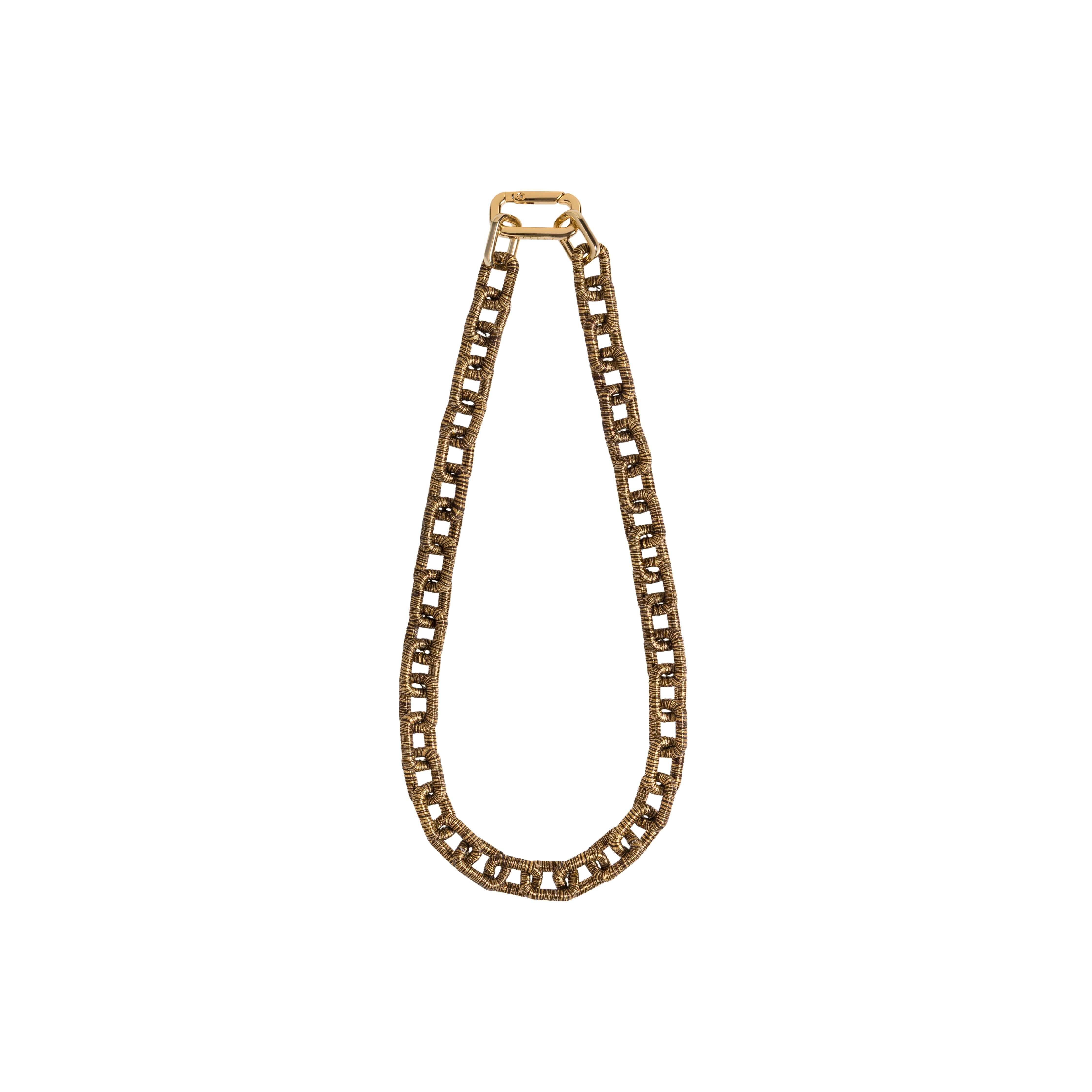 Catena Notte Necklace in Antique Gold, featuring hand-wrapped metallic chain links for elegance and unity.