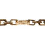 Catena Notte Necklace in antique gold with hand-wrapped metallic threads by Serena Uziyel, symbolizing unity and elegance.