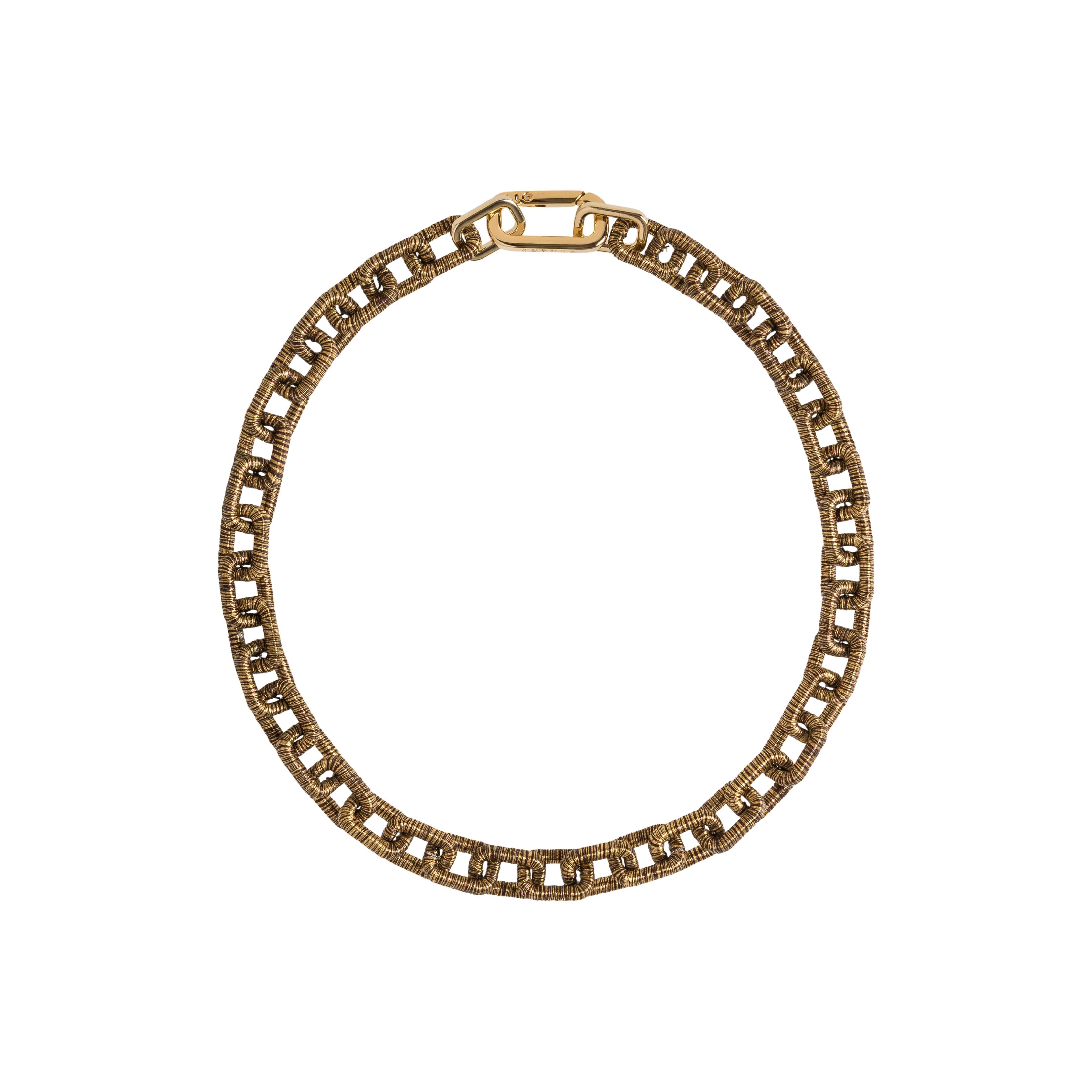 Catena Notte Necklace in Antique Gold, featuring hand-wrapped chain links symbolizing unity and elegance.