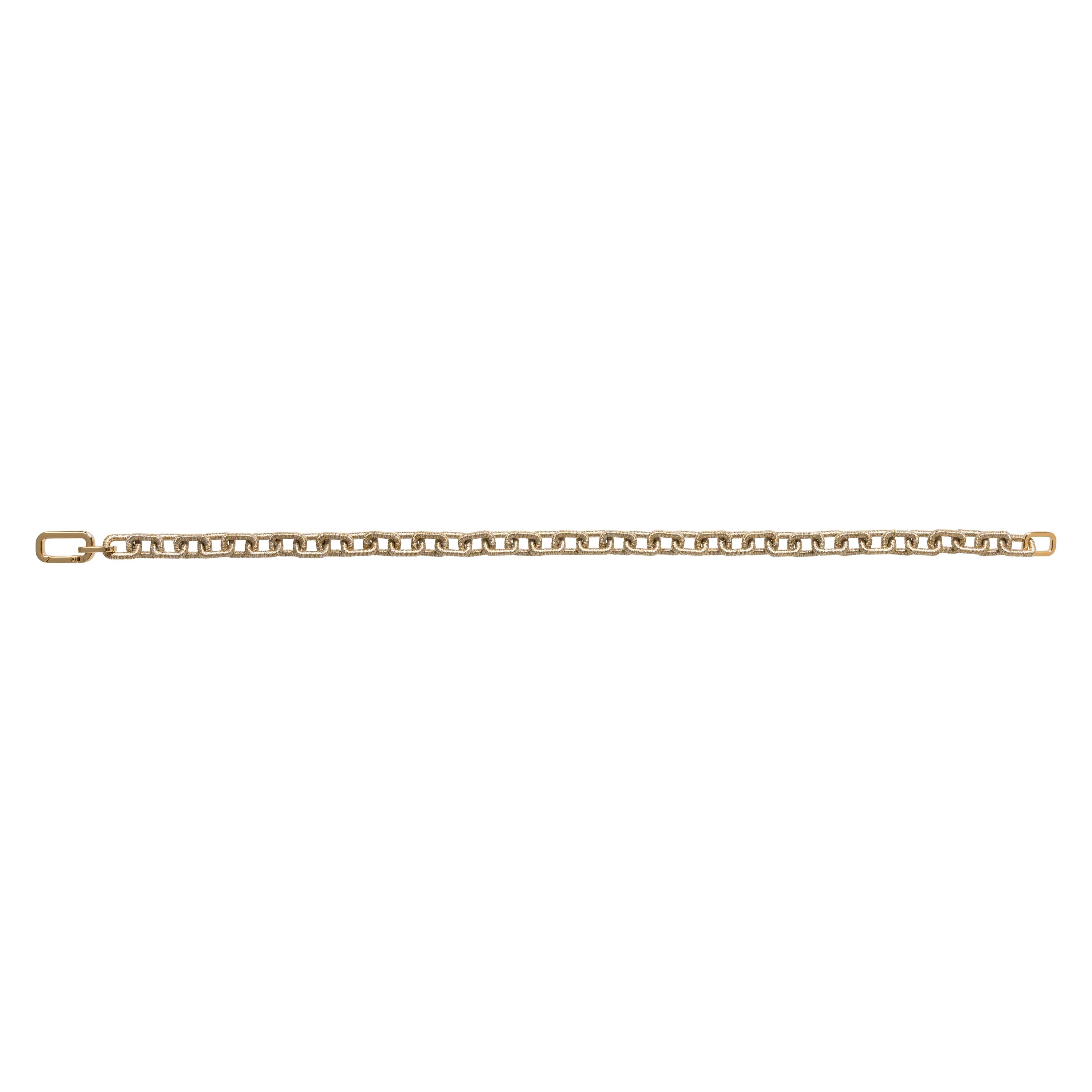 Catena Notte Necklace in gold and silver featuring hand-wrapped chain links, embodying unity and elegance.