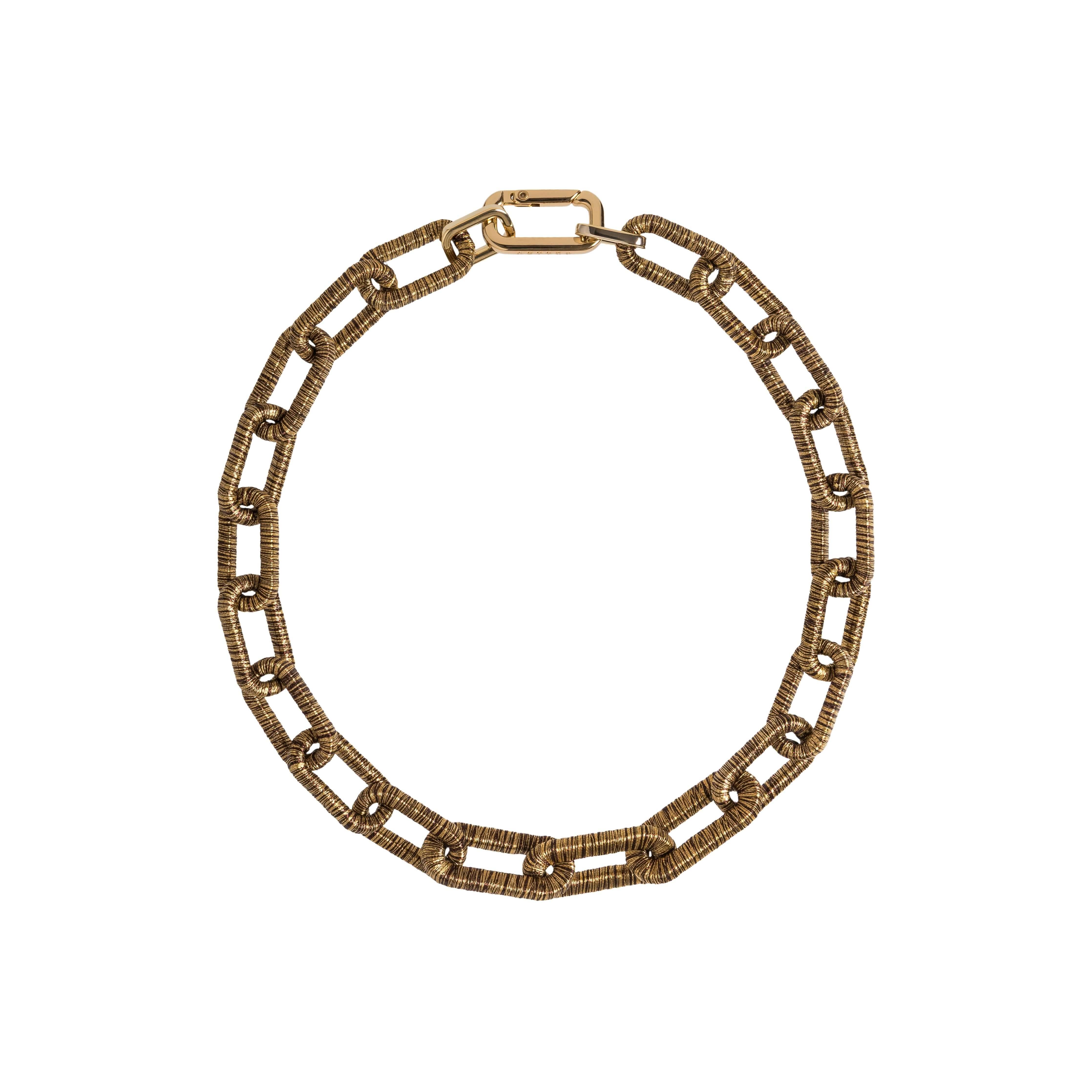 Catena rectangular necklace in antique gold with a unique chain link design, ideal for elegant occasions.