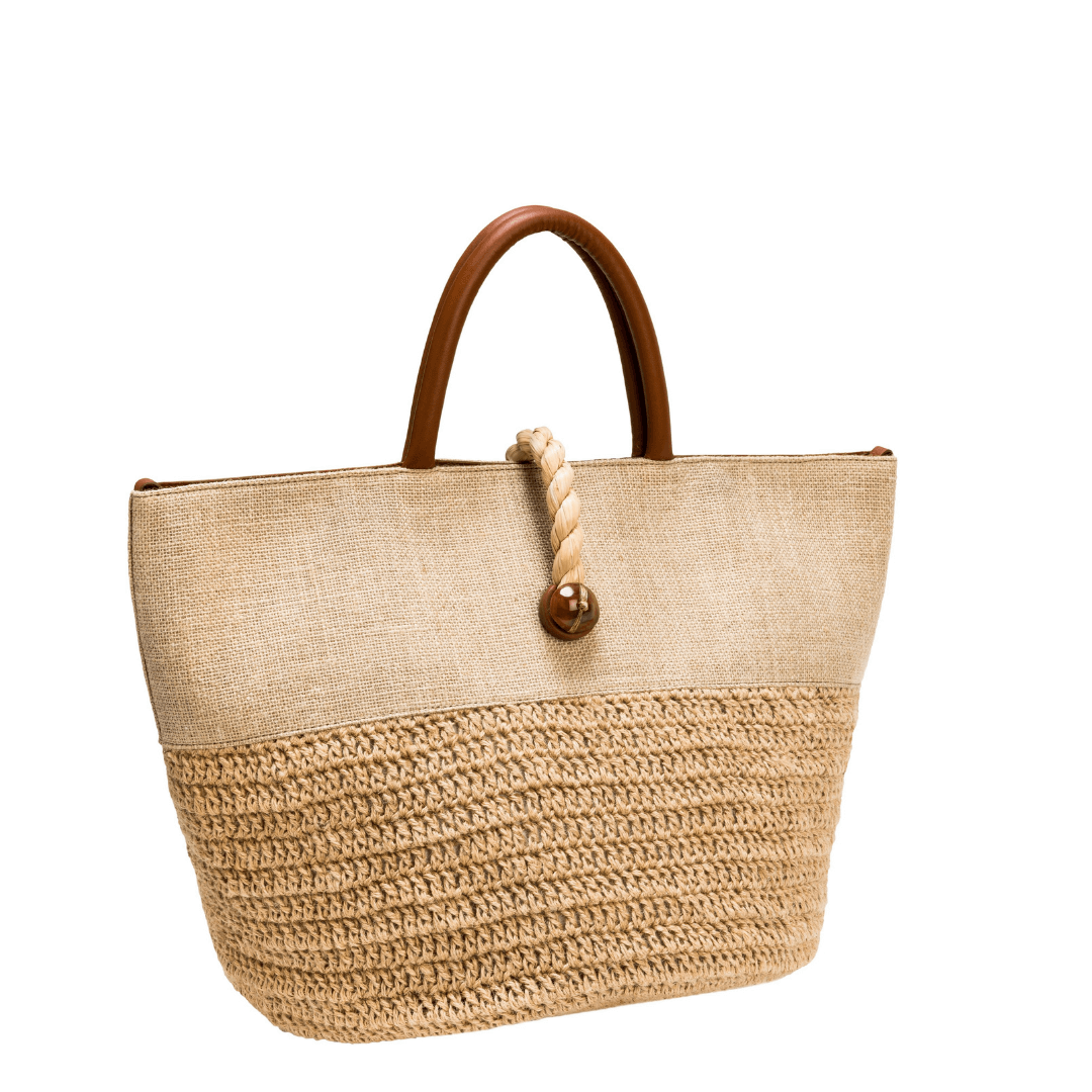 Melita Natural Large Tote Bag featuring smooth raffia, woven detailing, and a stylish silk tassel for summer elegance.