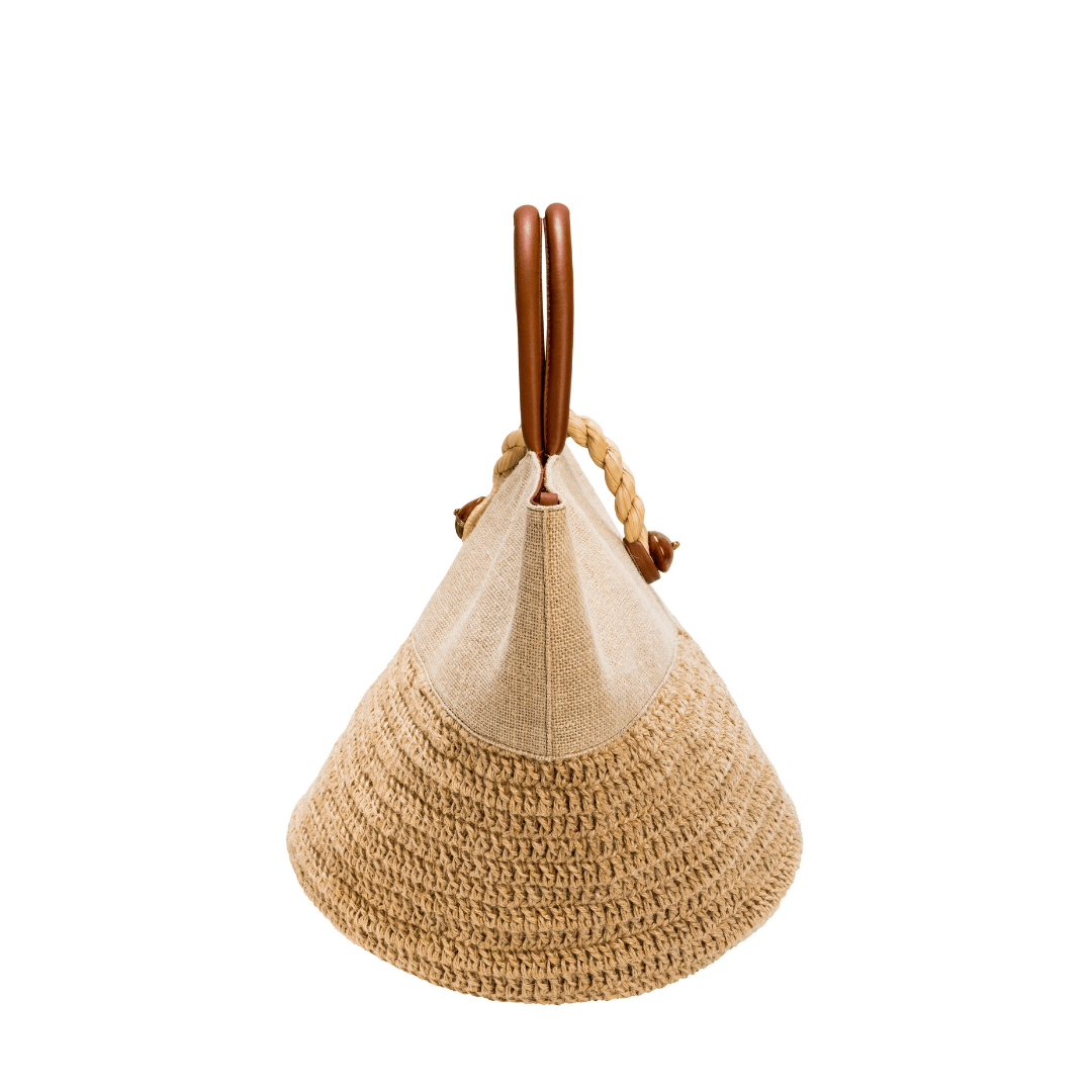 Stylish Melita Natural Large Tote Bag with woven raffia detailing and wooden handles for a chic summer look.