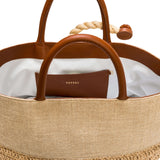 Interior view of Melita Natural Large Tote Bag featuring brown leather handles and a stylish design.