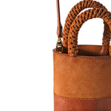 Rovena Camello Mini Bucket Bag featuring braided handles and rich tan suede texture.